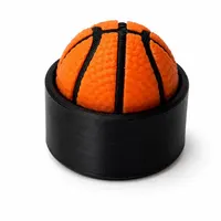 Basketball clicker fidget showing textured surface detail