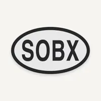 Oval Southern Outer Banks SOBX Bogg Bag charm, black lettering on light gray