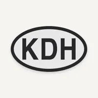 Oval Kill Devil Hills KDH Bogg Bag charm, black lettering on light gray
