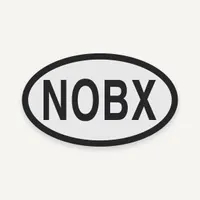 Oval Northern Outer Banks NOBX Bogg Bag charm, black lettering on light gray