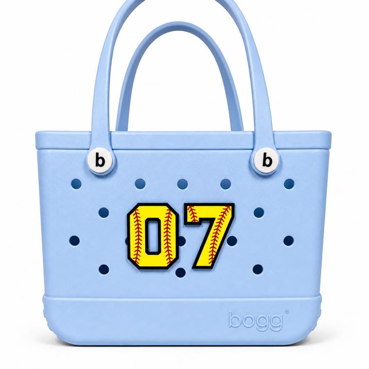 Personalized softball jersey number Bogg Bag charm in pink, number 7, flatlay